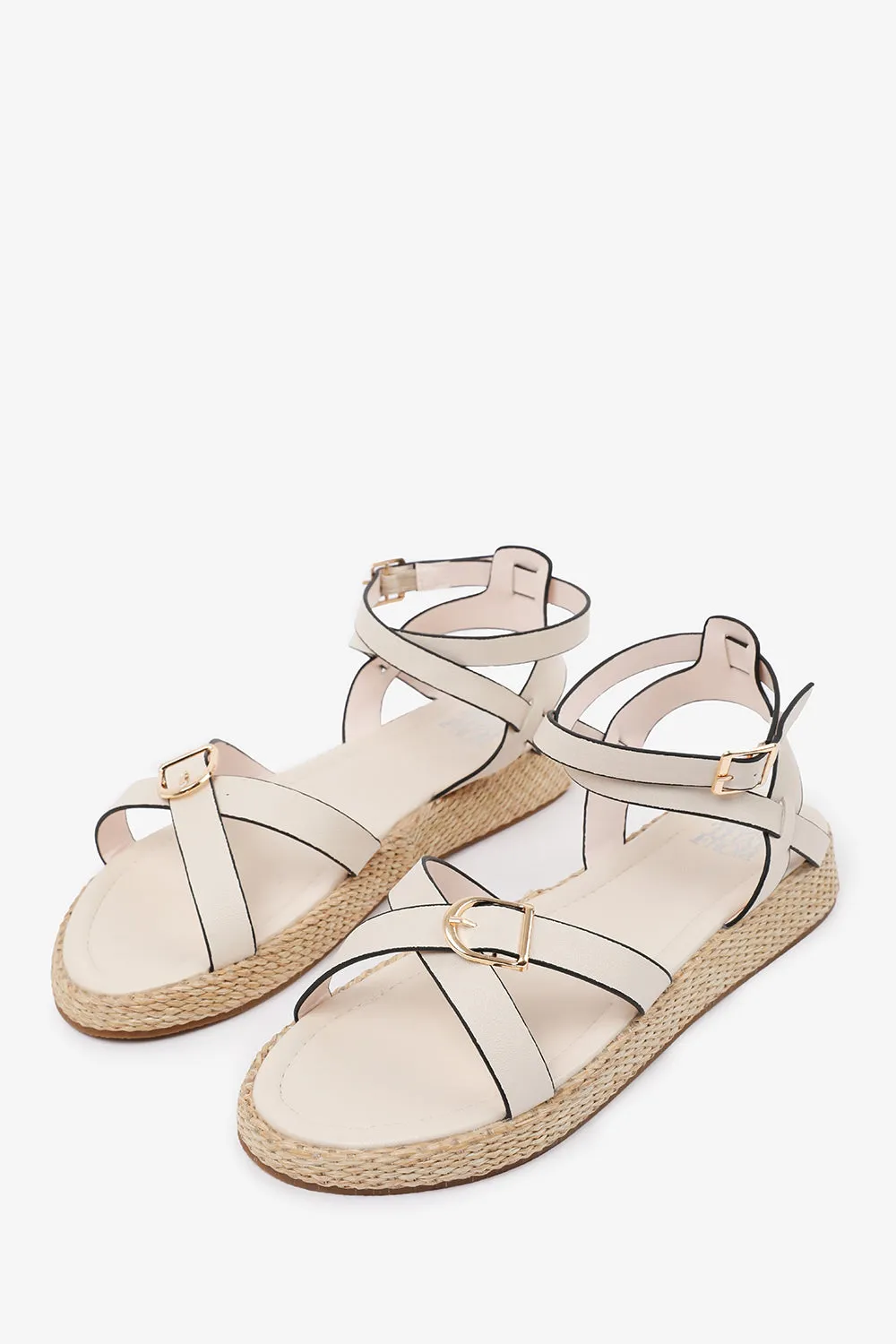 ALORA WIDE FIT CROSS OVER BUCKLE STRAP SANDALS IN CREAM FAUX LEATHER