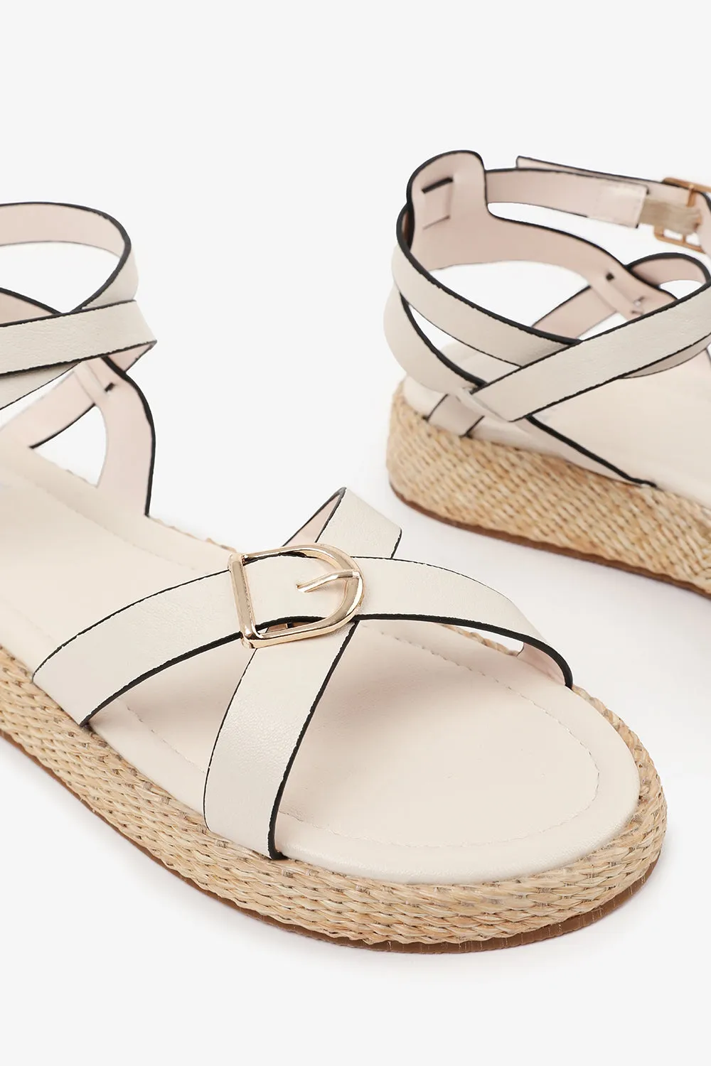 ALORA WIDE FIT CROSS OVER BUCKLE STRAP SANDALS IN CREAM FAUX LEATHER